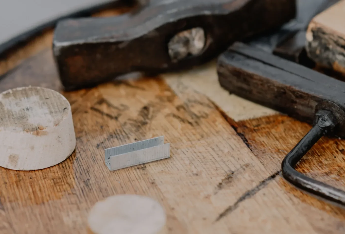 Carpentry tools on a barrell.
