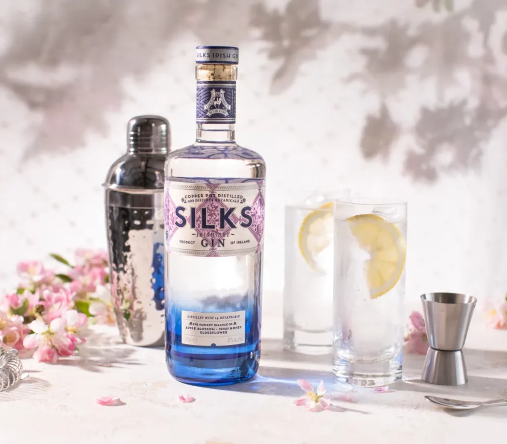 silks gin with cocktail mixer and glasses